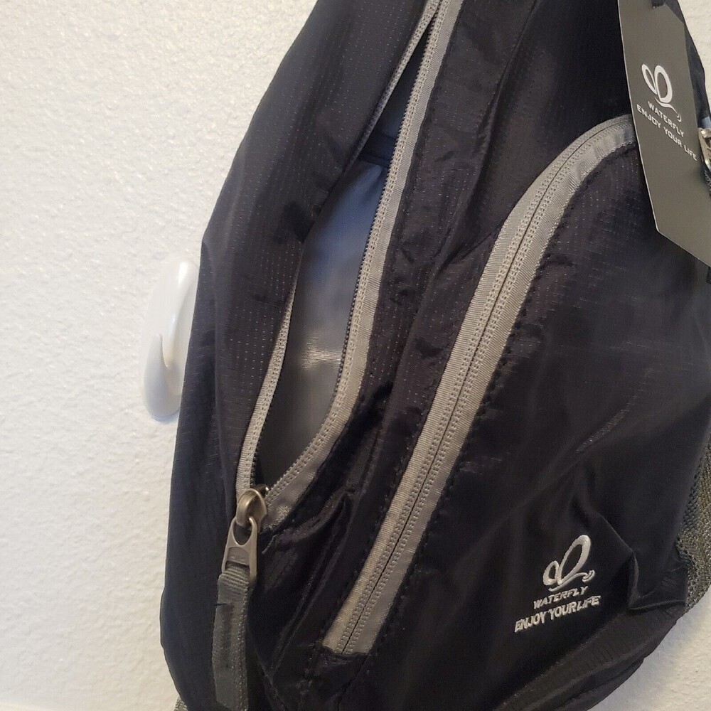 Waterfly Sling Pack - Black Gray Adjustable Strap Pockets Zippered NWT - Picture 15 of 16